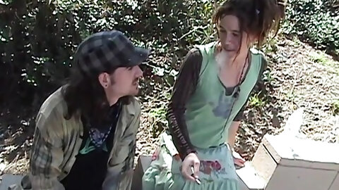 Homeless hippie couple humping for cash in public