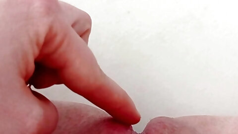 opening the folds of her pussy layer by layer until reaching her clitoris and urethra