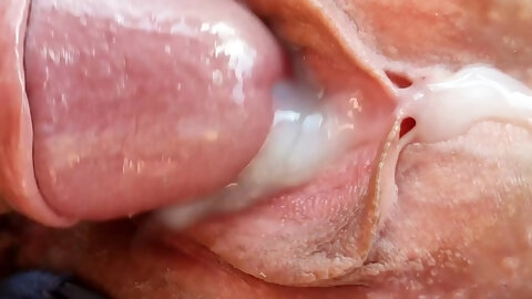 Step brother fucks married step sister and cums on her pussy. Close-up.